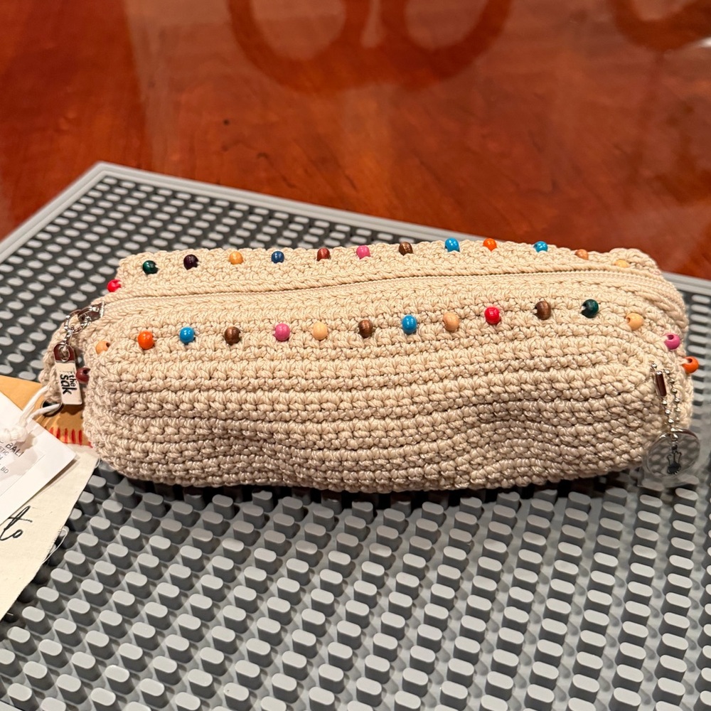 NWT The Sak Beige Crochet Cosmetic Bag with Multicolor Beads